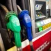 Diesel fuel pump at a gas station displaying fueling equipment and pricing information.