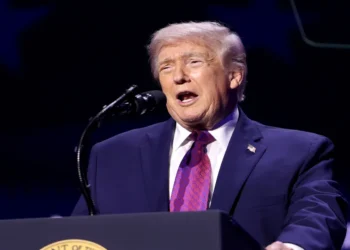 President Donald Trump speaks with attendees at the Build the Red Wall rally at Dream City Church in Phoenix, Arizona.