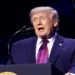 President Donald Trump speaks with attendees at the Build the Red Wall rally at Dream City Church in Phoenix, Arizona.