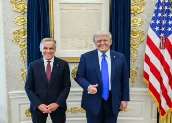 President Donald Trump and Canadian Prime Minister Mark Carney meet during a bilateral engagement on October 7, 2025.