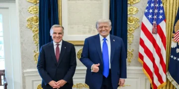 President Donald Trump and Canadian Prime Minister Mark Carney meet during a bilateral engagement on October 7, 2025.