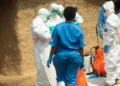Health workers prepare to bury an infant during an Ebola outbreak in Bembi, Democratic Republic of the Congo, on September 1, 2026.