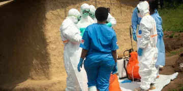 Health workers prepare to bury an infant during an Ebola outbreak in Bembi, Democratic Republic of the Congo, on September 1, 2026.