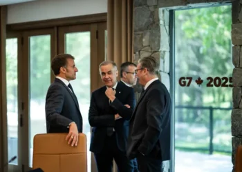 French, Canadian, and British leaders talk after Session I of the G7 Summit in Kananaskis, Alberta, on June 16, 2025.