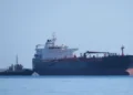 Oil and chemical tanker Gulf Muttrah departs the BP Oil Refinery jetty with tugboat assistance in Kwinana, Western Australia.