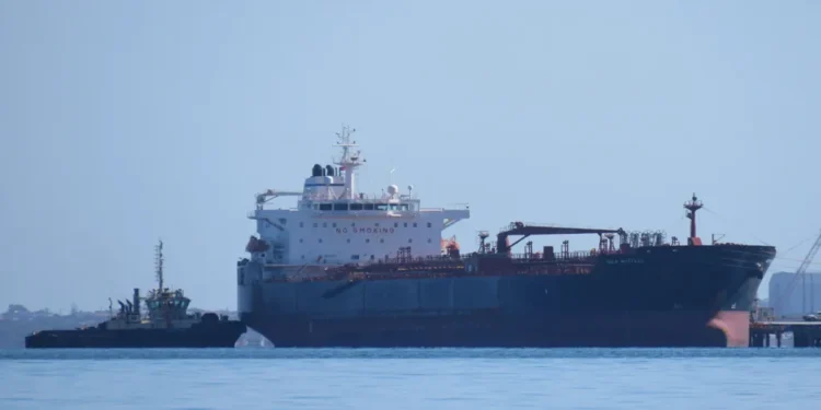 Oil and chemical tanker Gulf Muttrah departs the BP Oil Refinery jetty with tugboat assistance in Kwinana, Western Australia.