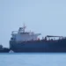 Oil and chemical tanker Gulf Muttrah departs the BP Oil Refinery jetty with tugboat assistance in Kwinana, Western Australia.