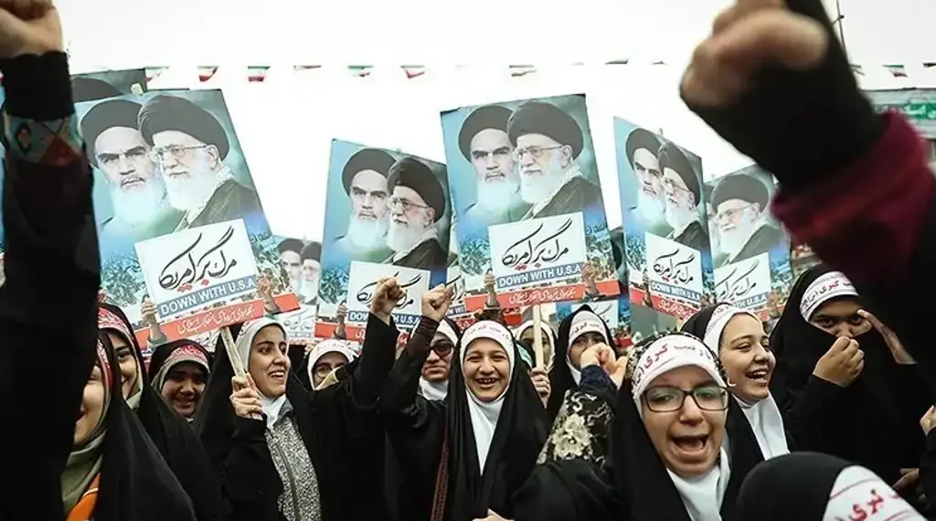 Iranian girls participate in the 22 Bahman rally marking the anniversary of Iran’s Islamic Revolution in Tehran on February 10, 2017.