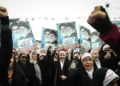 Iranian girls participate in the 22 Bahman rally marking the anniversary of Iran’s Islamic Revolution in Tehran on February 10, 2017.