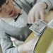 Child in Japan counting money received as New Year’s gift at home in Sapporo, Hokkaido.