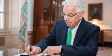 Pakistani foreign minister signs U.S. secretary of state’s guestbook before a meeting at the State Department in Washington, D.C.