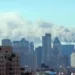 Manhattan skyline with smoke billowing from the Twin Towers after the September 11, 2001 terrorist attacks in New York City