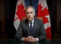 Canadian Prime Minister Mark Carney delivers a televised message marking International Women's Day in March 2026.