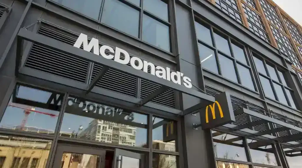 McDonald’s Hamburger University building photographed in summer 2018, showing the training facility and surrounding grounds.