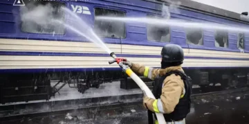 Train in Mykolaiv after a Russian drone attack damaged transport infrastructure on March 4, 2026, injuring a train inspector.