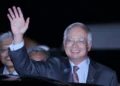 Najib Razak arrives in Bali, Indonesia, for the 2013 Asia-Pacific Economic Cooperation summit on October 6, 2013.