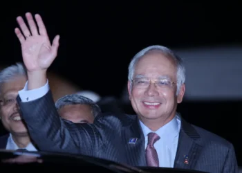 Najib Razak arrives in Bali, Indonesia, for the 2013 Asia-Pacific Economic Cooperation summit on October 6, 2013.