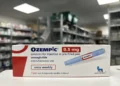 Ozempic semaglutide 0.5 mg packaging displayed in a pharmacy, photographed in August 2023.