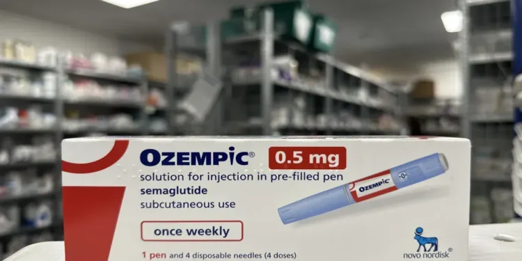 Ozempic semaglutide 0.5 mg packaging displayed in a pharmacy, photographed in August 2023.