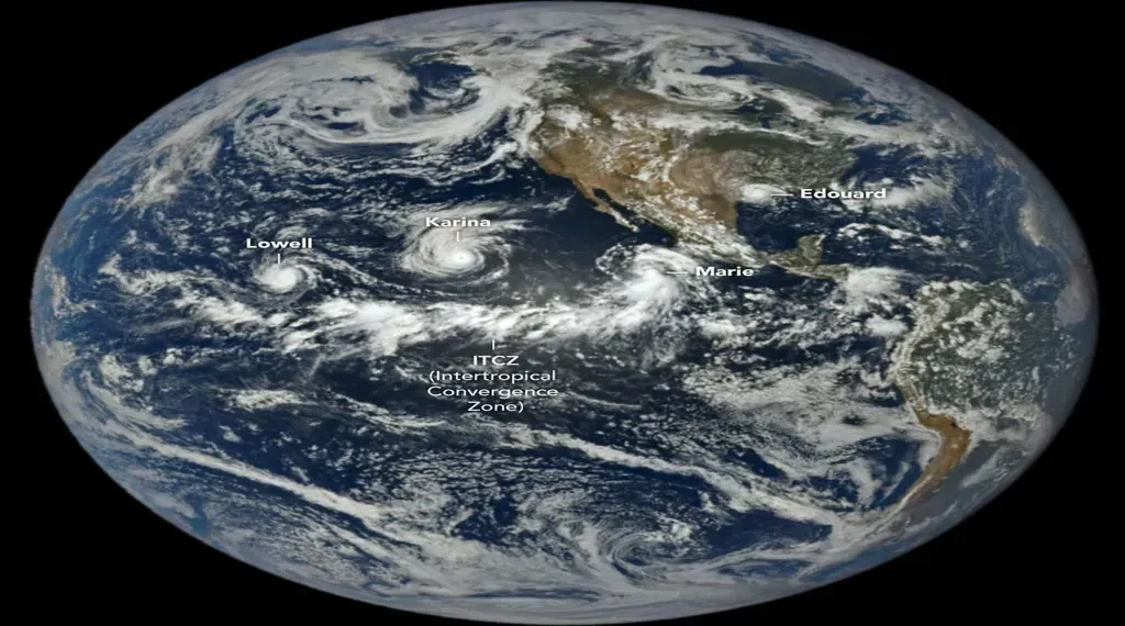 Satellite view of tropical cyclones Lowell, Karina and Marie swirling over the Pacific Ocean west of Central America.