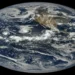 Satellite view of tropical cyclones Lowell, Karina and Marie swirling over the Pacific Ocean west of Central America.