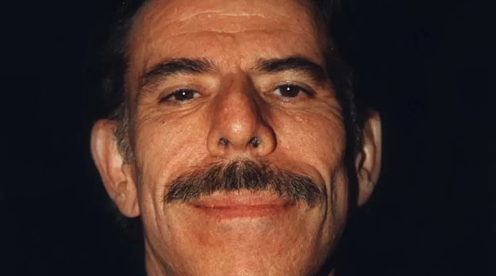 Peter Max attends a Larry King cardiac charity event in 1998, photographed for a celebrity photo collection.