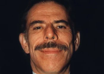 Peter Max attends a Larry King cardiac charity event in 1998, photographed for a celebrity photo collection.