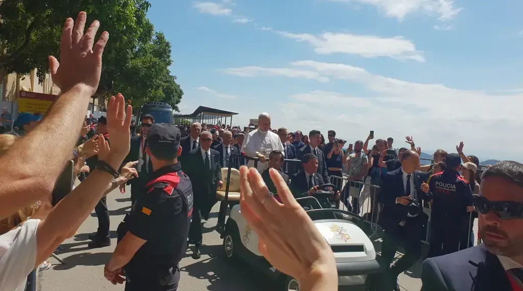 Pope Leo XIV greets pilgrims from an open popemobile during his visit to Montserrat Abbey in Catalonia on June 10, 2026.
