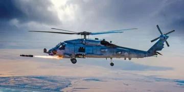 MH-60R Seahawk helicopter assigned to Royal Saudi Naval Forces fires an AGM-114 Hellfire missile near Jubail Naval Air Base, Saudi Arabia.