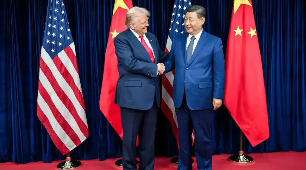 U.S. and Chinese leaders greet before a bilateral meeting at Gimhae International Airport in Busan, South Korea, on October 30, 2025.