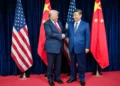 U.S. and Chinese leaders greet before a bilateral meeting at Gimhae International Airport in Busan, South Korea, on October 30, 2025.