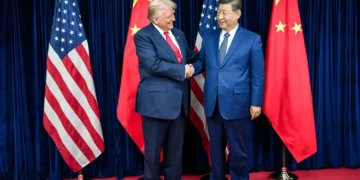 U.S. and Chinese leaders greet before a bilateral meeting at Gimhae International Airport in Busan, South Korea, on October 30, 2025.