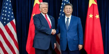 U.S. and Chinese leaders greet before a bilateral meeting at Gimhae International Airport in Busan, South Korea, on October 30, 2025.