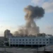 Dust rises over Tyre, Lebanon, after an Israeli airstrike during the 2006 Lebanon War on July 26, 2006.