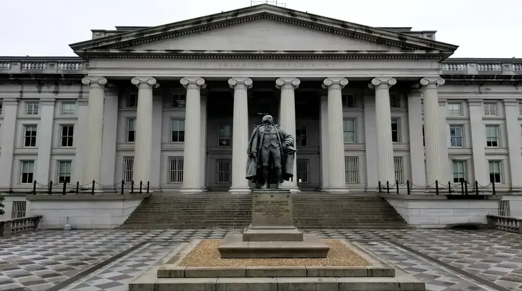 North entrance of the U.S. Treasury Building with the Albert Gallatin statue in Washington, D.C.