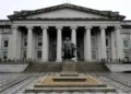 North entrance of the U.S. Treasury Building with the Albert Gallatin statue in Washington, D.C.