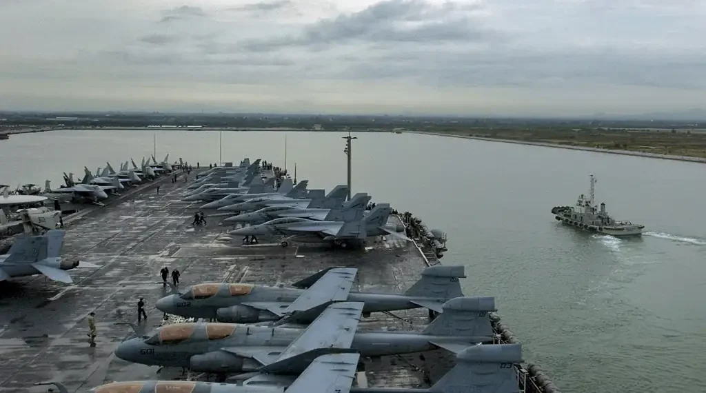 USS Abraham Lincoln aircraft carrier arrives at Laem Chabang, Thailand, during a 2006 Western Pacific deployment.