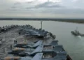 USS Abraham Lincoln aircraft carrier arrives at Laem Chabang, Thailand, during a 2006 Western Pacific deployment.