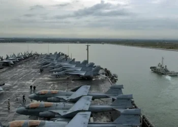 USS Abraham Lincoln aircraft carrier arrives at Laem Chabang, Thailand, during a 2006 Western Pacific deployment.