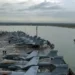 USS Abraham Lincoln aircraft carrier arrives at Laem Chabang, Thailand, during a 2006 Western Pacific deployment.