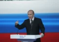 Vladimir Putin speaks during an interregional conference in Volgograd, Russia, on May 6, 2011, proposing creation of the All-Russia Popular Front.
