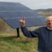 Wendell Berry stands beside solar panels on his farm in Henry County, Kentucky, in a photograph taken in 2011.
