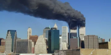 Plumes of smoke rise from the World Trade Center towers in Lower Manhattan after the September 11 attacks on September 11, 2001.