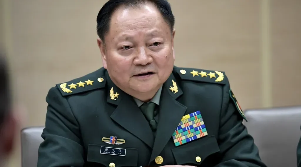 Chinese military official Zhang Youxia meets Russian President Vladimir Putin and Defense Minister Sergei Shoigu in Moscow on December 7, 2017.