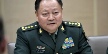 Chinese military official Zhang Youxia meets Russian President Vladimir Putin and Defense Minister Sergei Shoigu in Moscow on December 7, 2017.