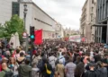 Acampada del Sol gathering along Camino del Congreso, photographed on October 2, 2026.