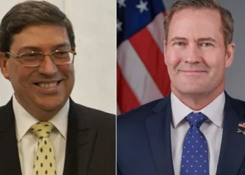 Side-by-side composite featuring Cuban Foreign Minister Bruno Rodríguez Parrilla on the left, photographed in 2013, and U.S. Ambassador to the United Nations Mike Waltz on the right, in an official portrait from September 2025.
