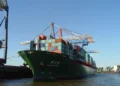 China Shipping Line vessel Xin Chang Shu sailing at sea, photographed by Beat Strasser in September 2006.