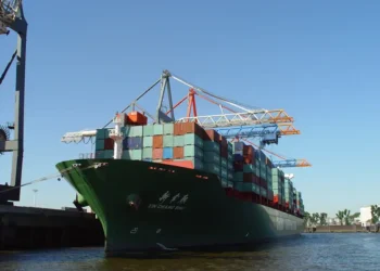 China Shipping Line vessel Xin Chang Shu sailing at sea, photographed by Beat Strasser in September 2006.