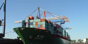 China Shipping Line vessel Xin Chang Shu sailing at sea, photographed by Beat Strasser in September 2006.